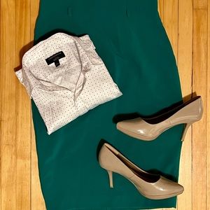 Banana Republic women’s dress shirt. Size 4. White with little black polka dots.